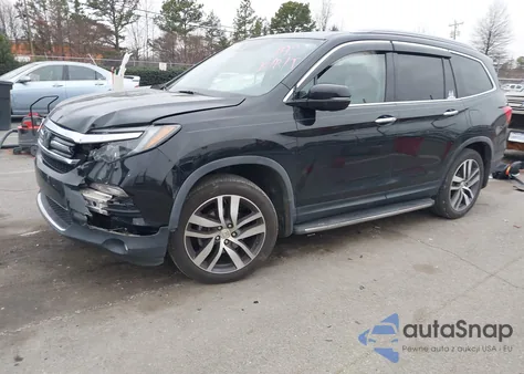 2017 Honda Pilot Touring z USA, uszkodzony, nr VIN 5FNYF5H9XHB031982
